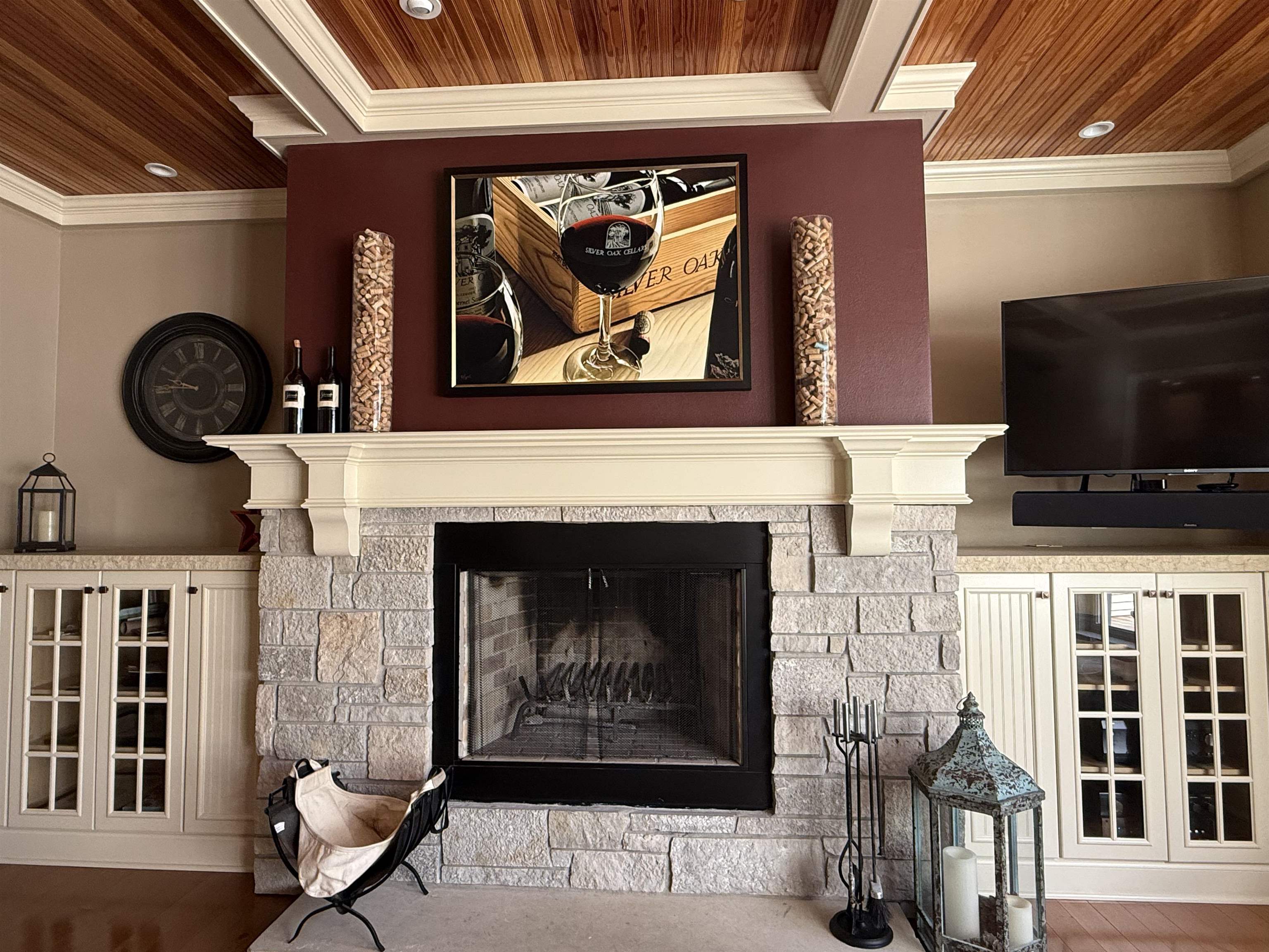 7432 Timber Ridge Road Roscoe, IL 61073 - Photo 3 of 17 a living room with fireplace furniture and a flat screen tv
