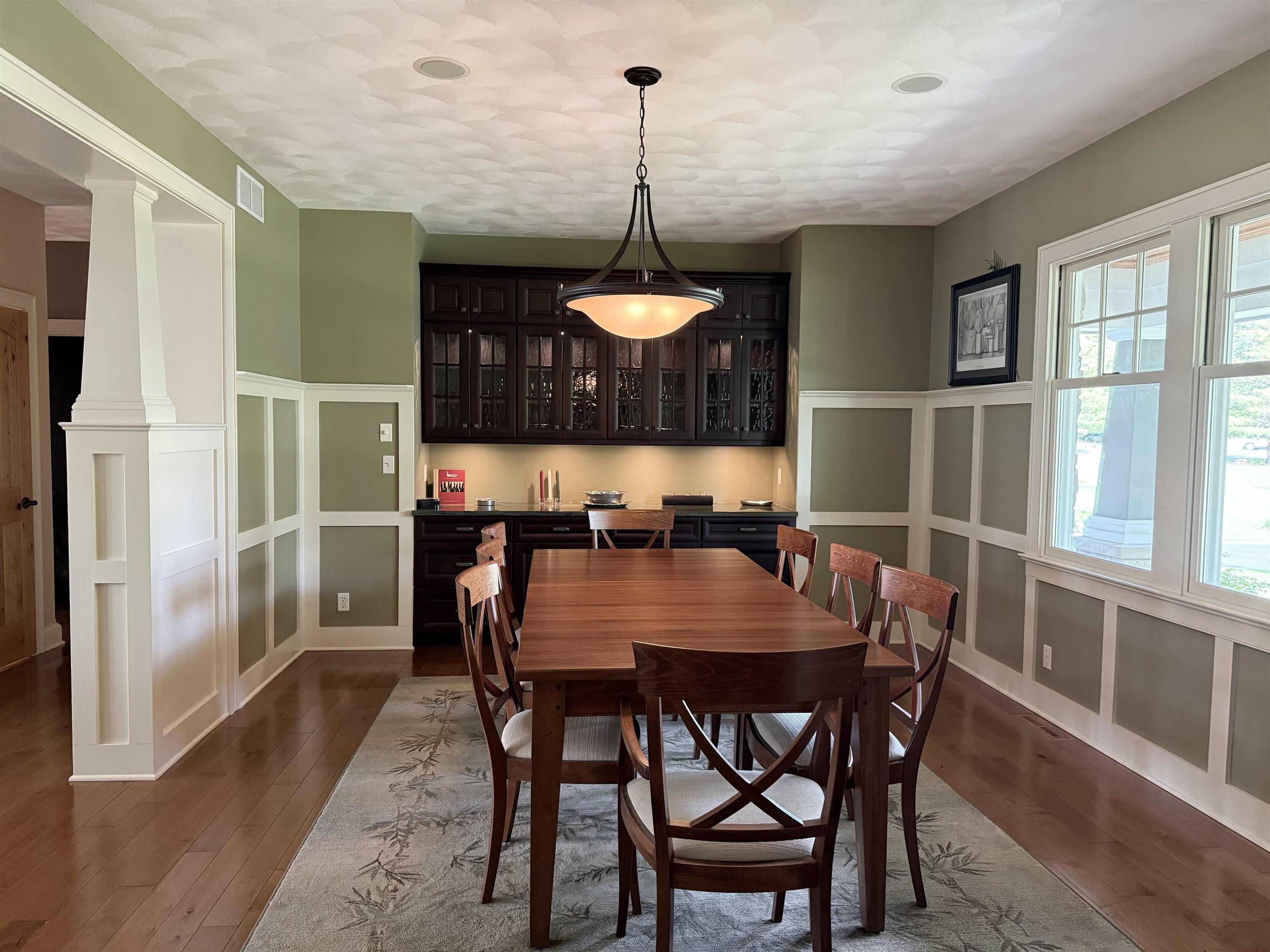 7432 Timber Ridge Road Roscoe, IL 61073 - Photo 8 of 17 a view of a dining room with furniture window and wooden floor