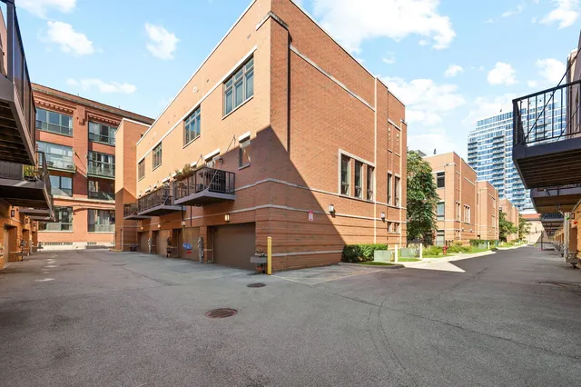 a view of a house with a street