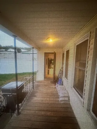 a lobby with furniture and rug