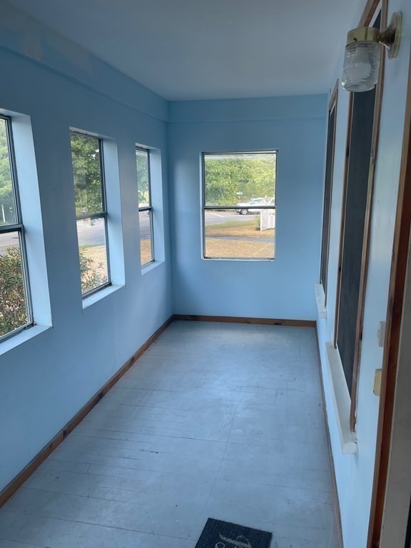 136 Ferry Street, Unit 2 Grafton, MA 01560 - Photo 2 of 29 a view of an empty room with a window