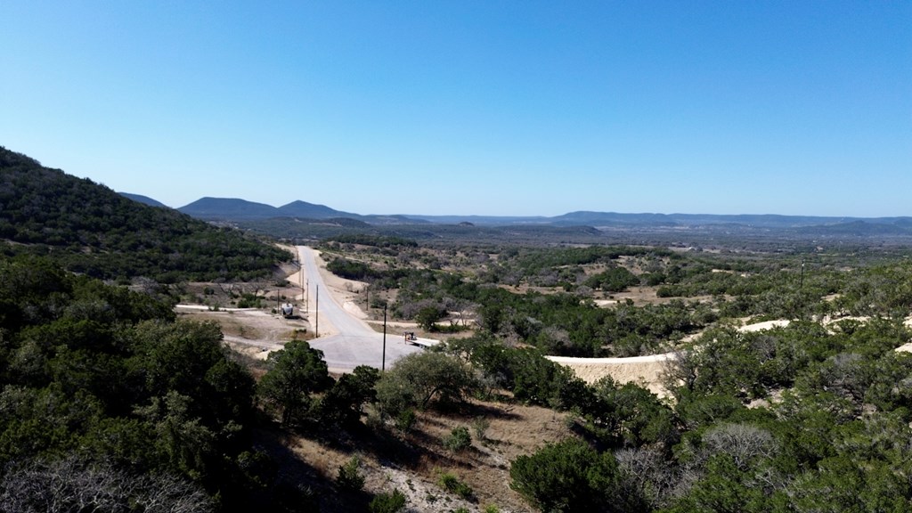 Tbd Tbd Other Bandera, TX 78003 - Photo 4 of 14 a view of a mountain in the distance in a field