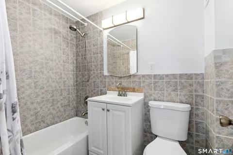 a view of a balcony with chairs