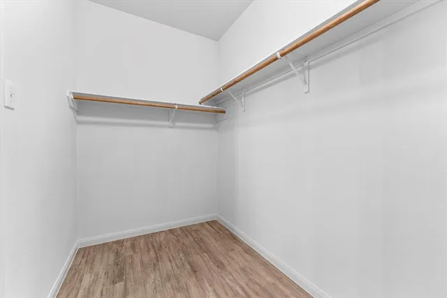 a view of an empty walk in closet