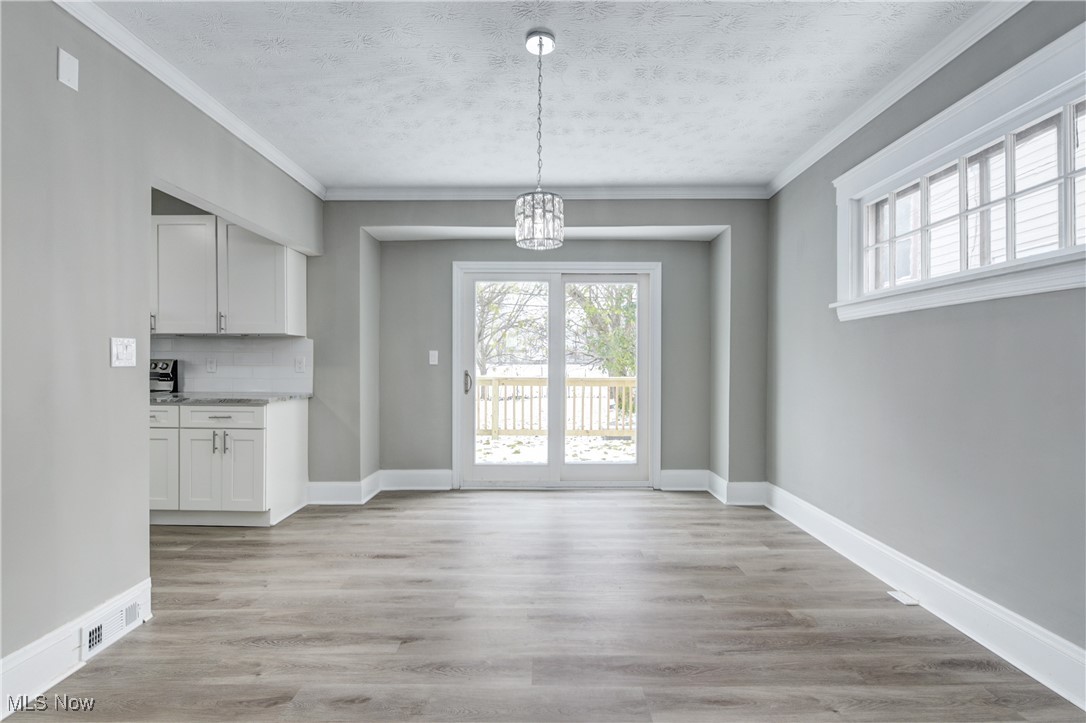 3272 Berea Road Cleveland, OH 44111 - Photo 10 of 29 Open concept. Dining room with slider door to bacyard