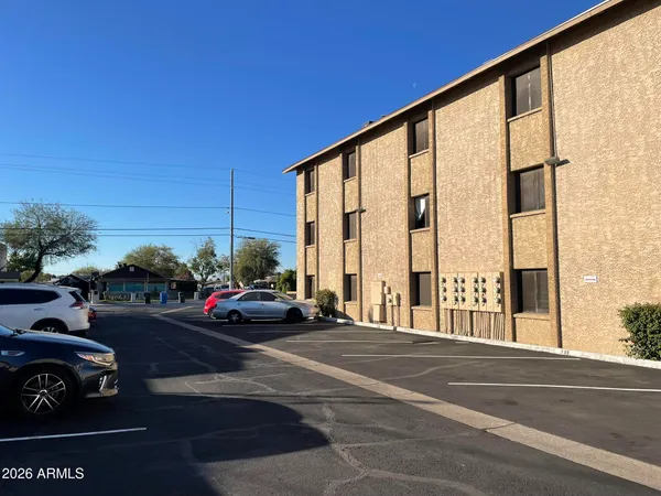 a view of a street with cars