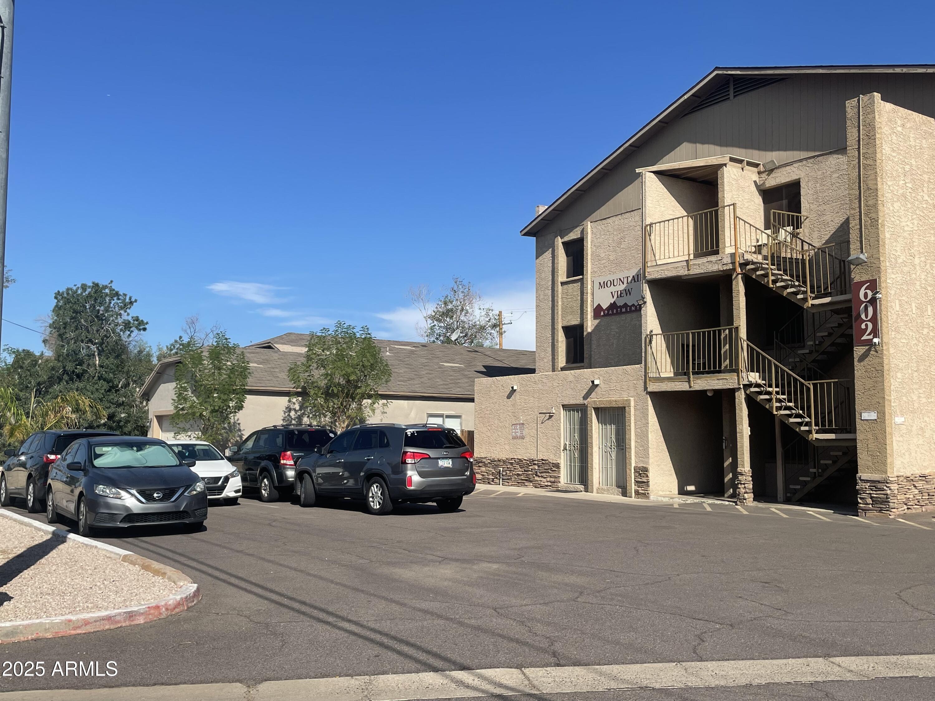 602 East Townley Avenue, Unit 305 Phoenix, AZ 85020 - Photo 17 of 21 a view of a car parked in front of a house