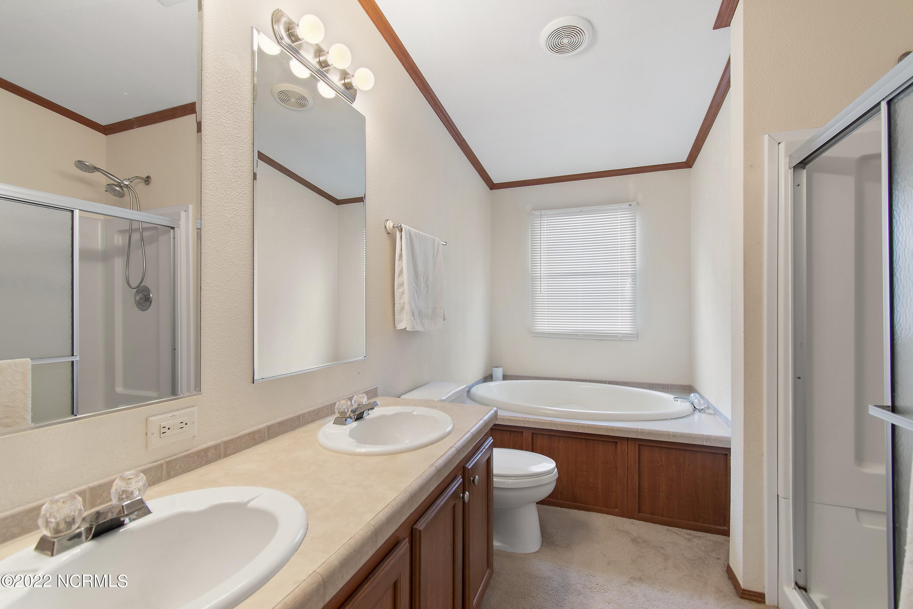 512 Cherokee Road Southport, NC 28461 - Photo 10 of 32 Master Bath