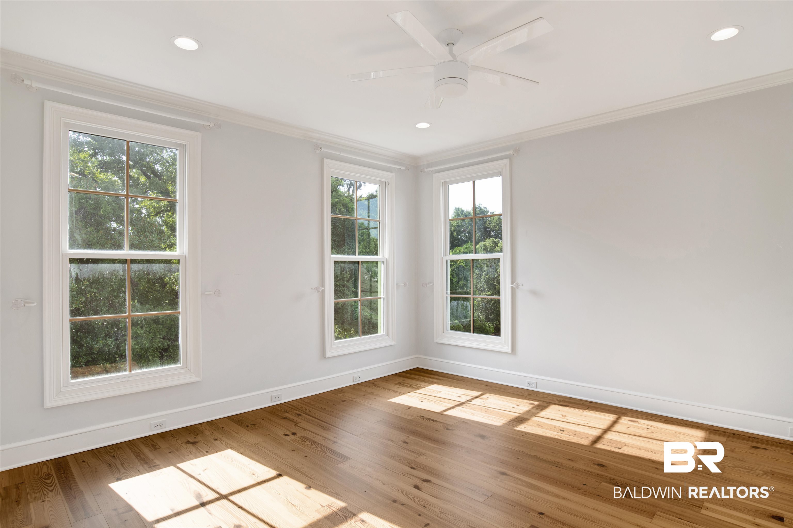 3816 Austill Lane Mobile, AL 36608 - Photo 39 of 80 Empty room with crown molding, wood-type flooring, a ceiling fan, and recessed lighting