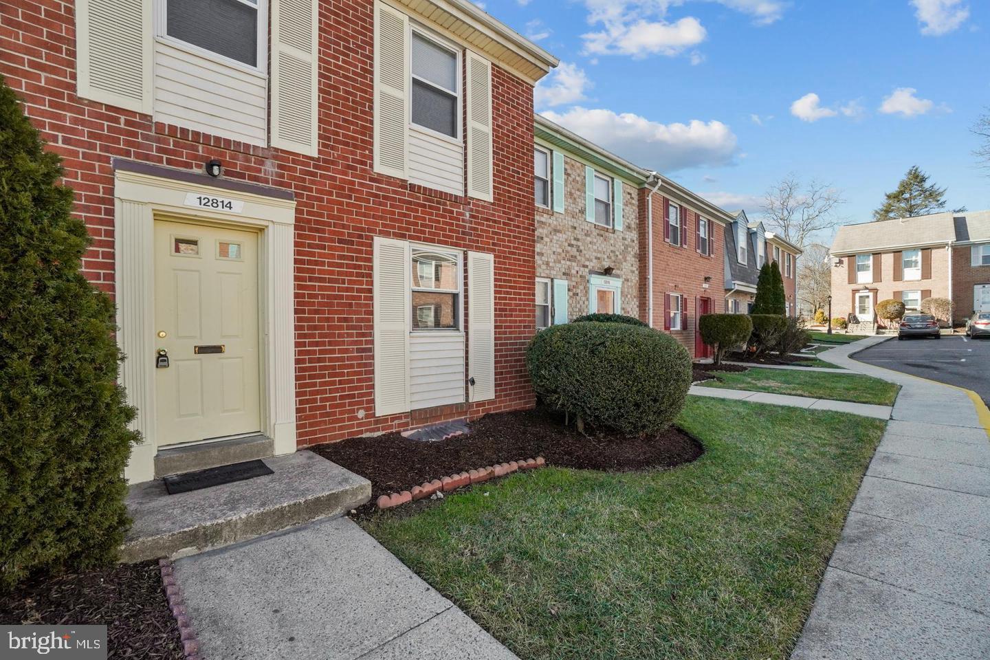12814 Epping Terrace, Unit 2B Silver Spring, MD 20906 - Photo 2 of 28 Charming brick facade in a serene setting.