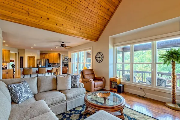 a view of a chairs and table on the wooden floor