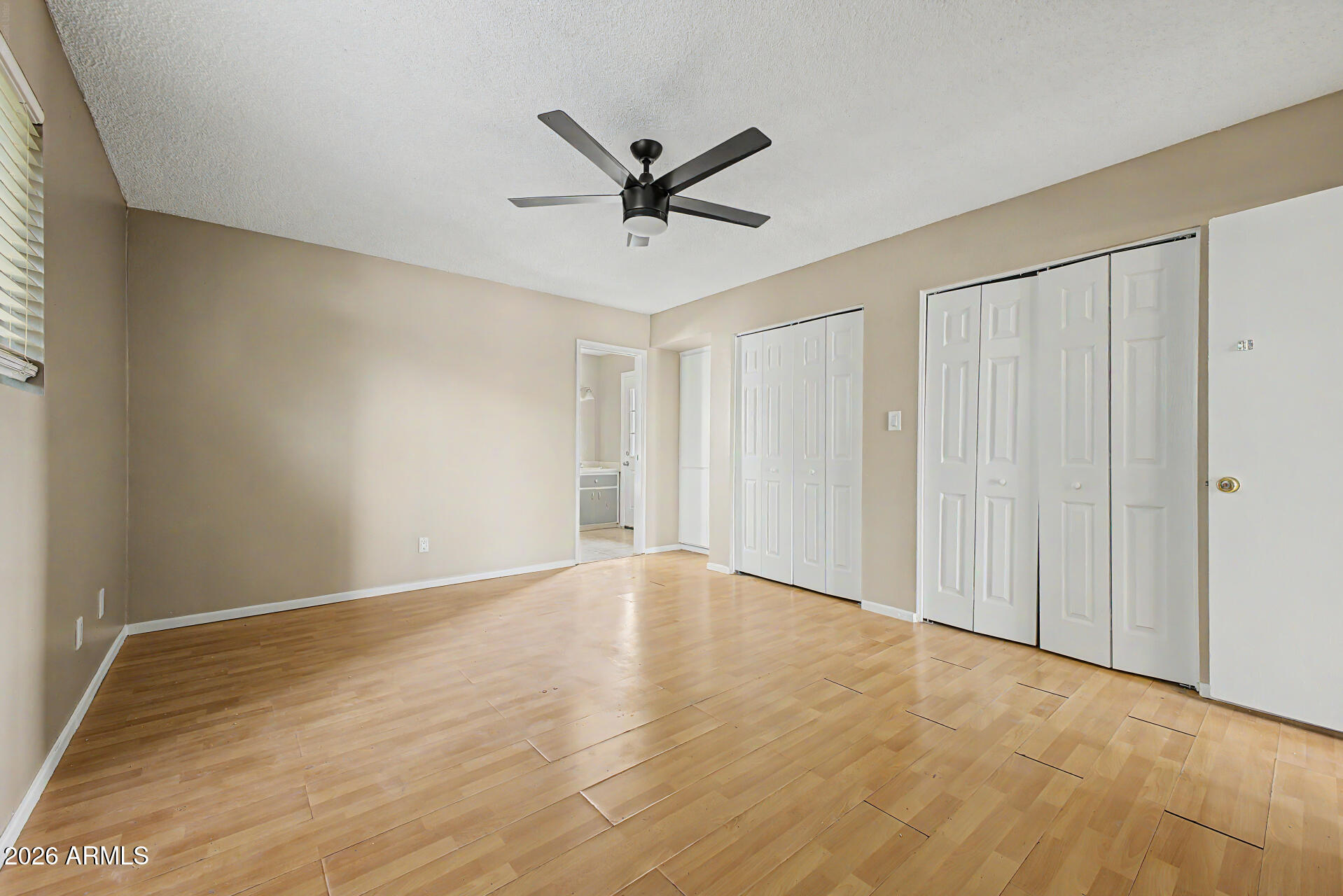 4007 West Mountain View Road Phoenix, AZ 85051 - Photo 17 of 31 a view of an empty room with a window