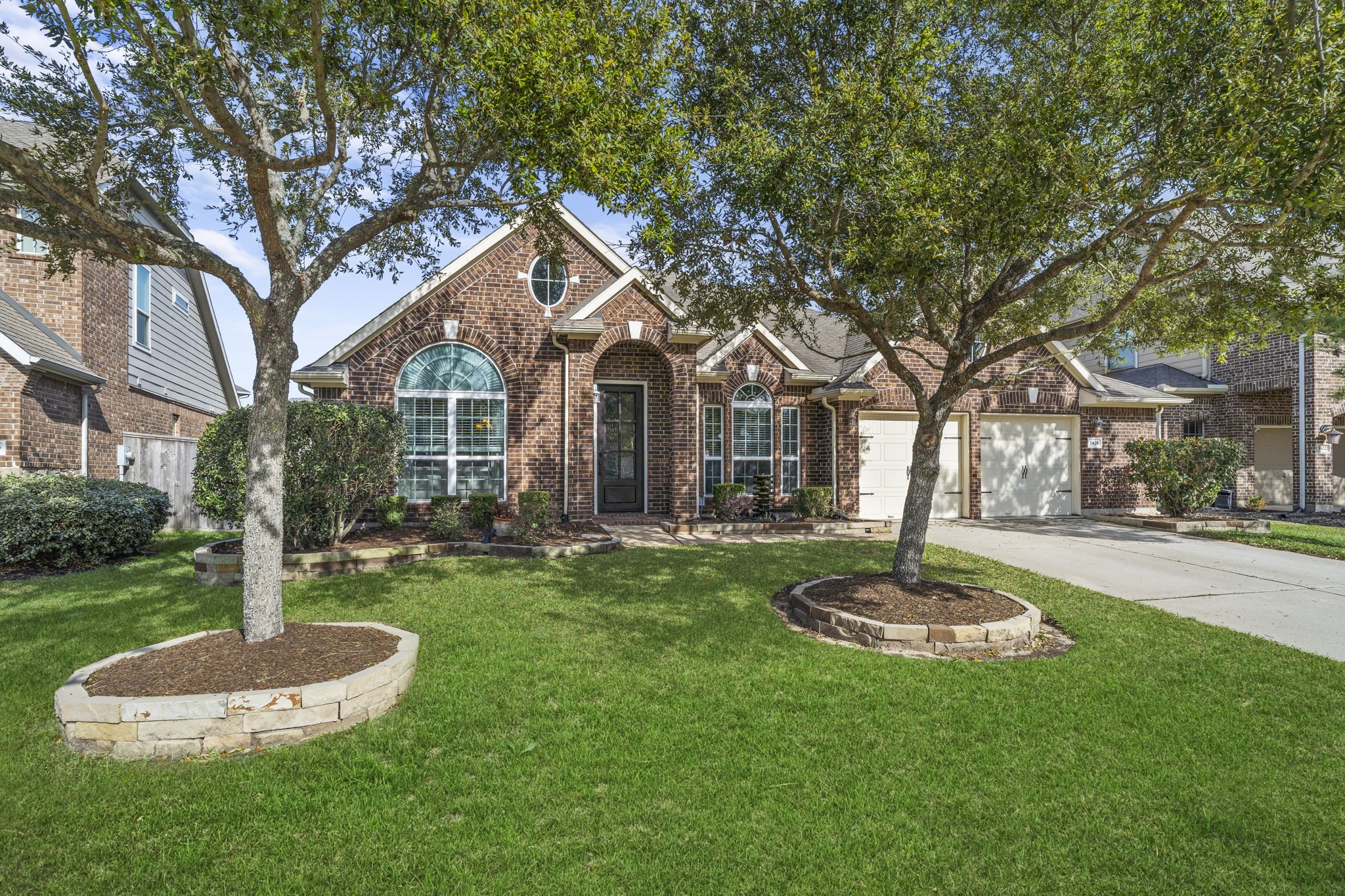 3426 Summer Ranch Drive Katy, TX 77494 - Photo 37 of 48 Lush green lawn space, mature shade trees, and thoughtfully designed landscaping create standout curb appeal and a picture-perfect setting you’ll love coming home to.