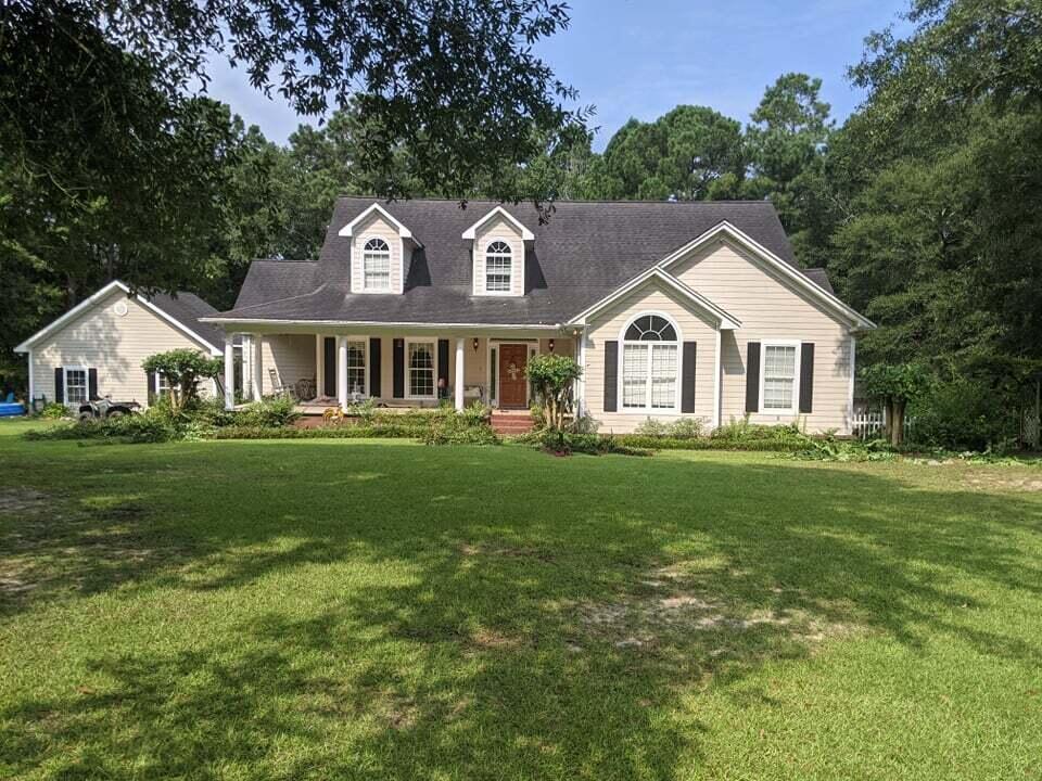 21127 Benvalen Road Andalusia, AL 36420 - Photo 1 of 36 a front view of a house with a garden