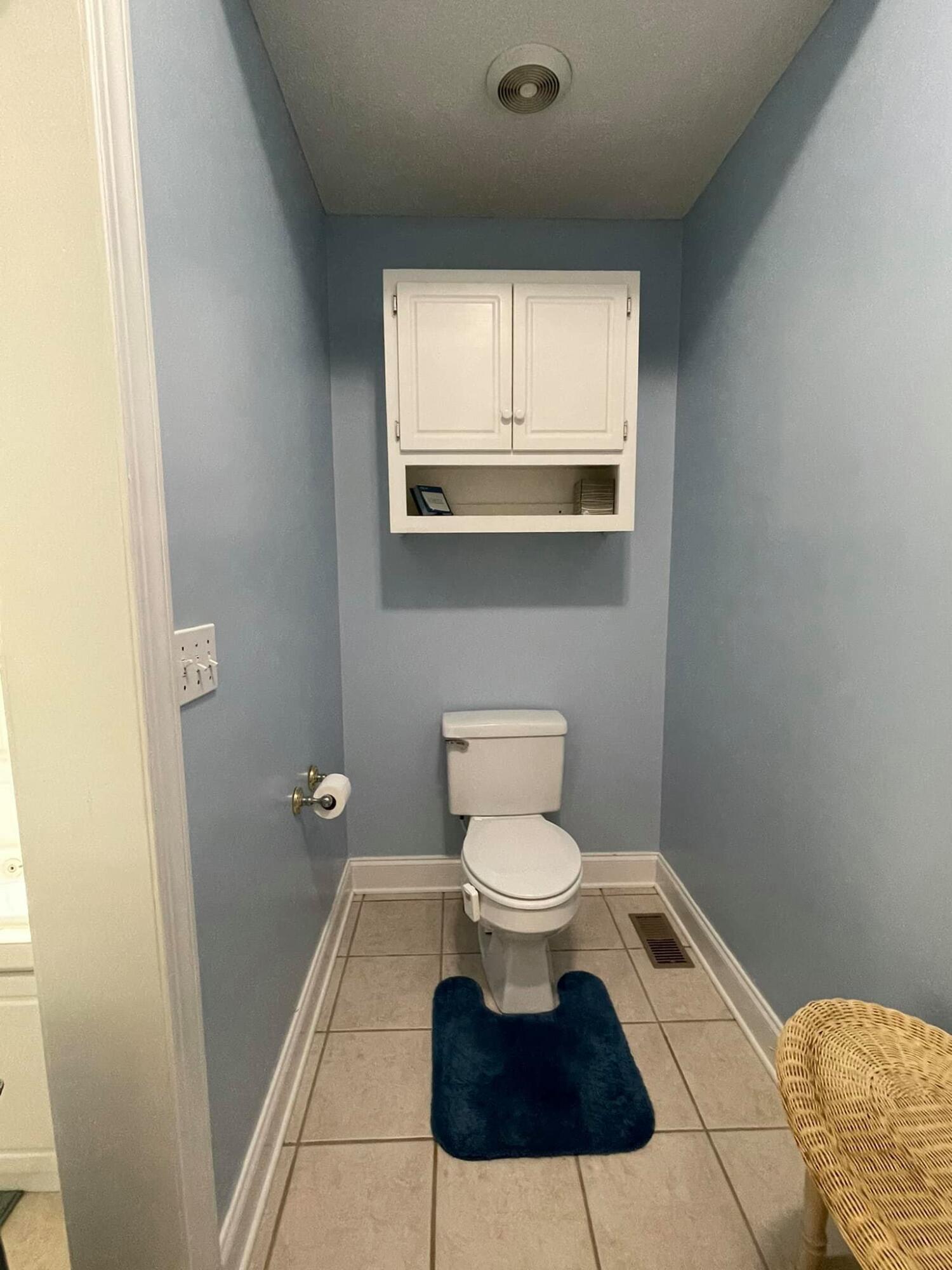 21127 Benvalen Road Andalusia, AL 36420 - Photo 13 of 36 a bathroom with a toilet and a vanity