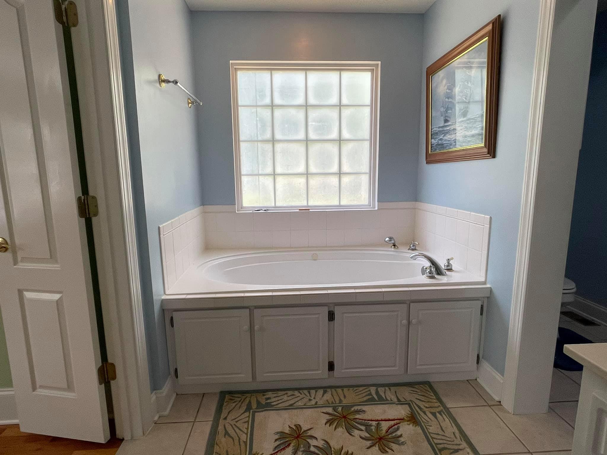 21127 Benvalen Road Andalusia, AL 36420 - Photo 19 of 36 a bathroom with a sink and a window