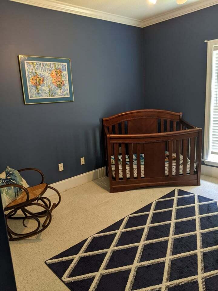 21127 Benvalen Road Andalusia, AL 36420 - Photo 22 of 36 a room with a black white checkered floor with a black white and white checkered floor