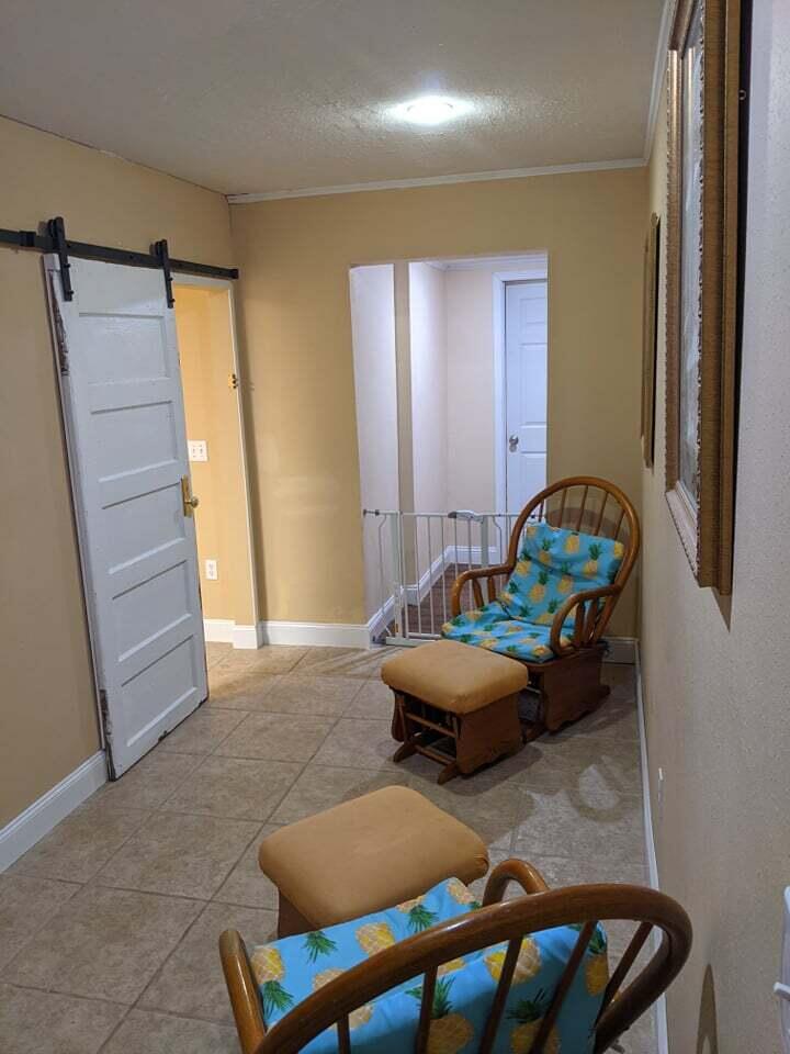 21127 Benvalen Road Andalusia, AL 36420 - Photo 30 of 36 a room with furniture and stairs