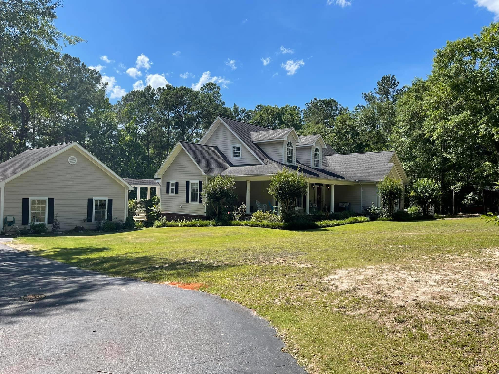 21127 Benvalen Road Andalusia, AL 36420 - Photo 34 of 36 a front view of a house with a garden