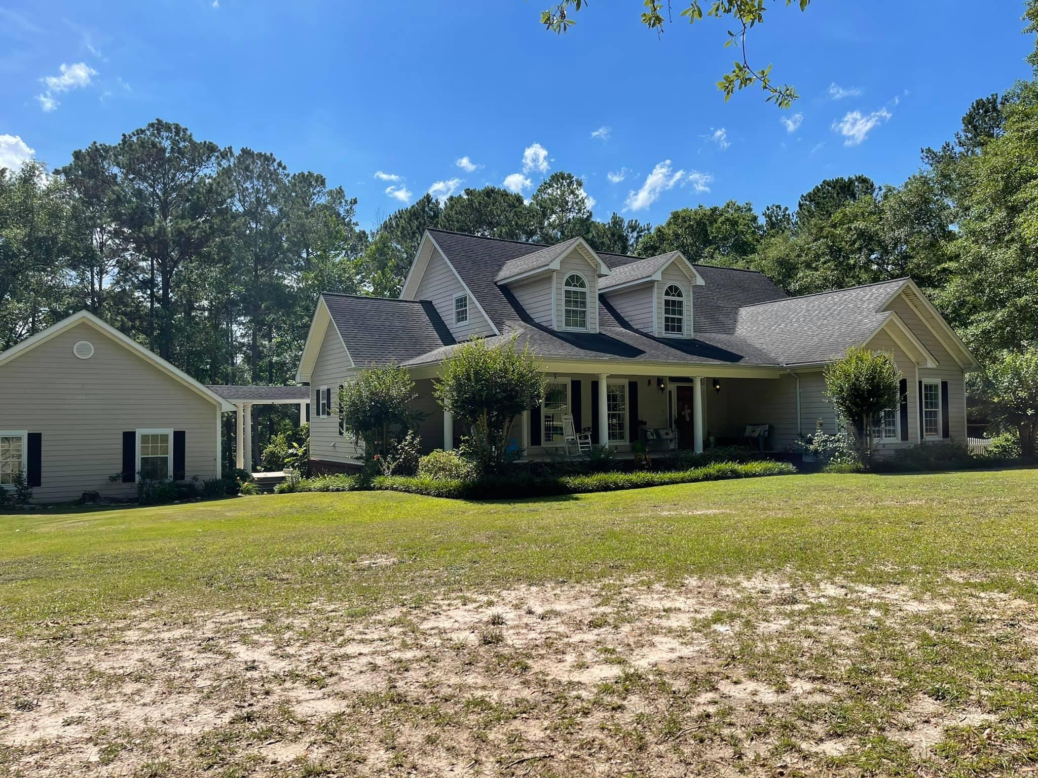 21127 Benvalen Road Andalusia, AL 36420 - Photo 35 of 36 a view of a house with a big yard