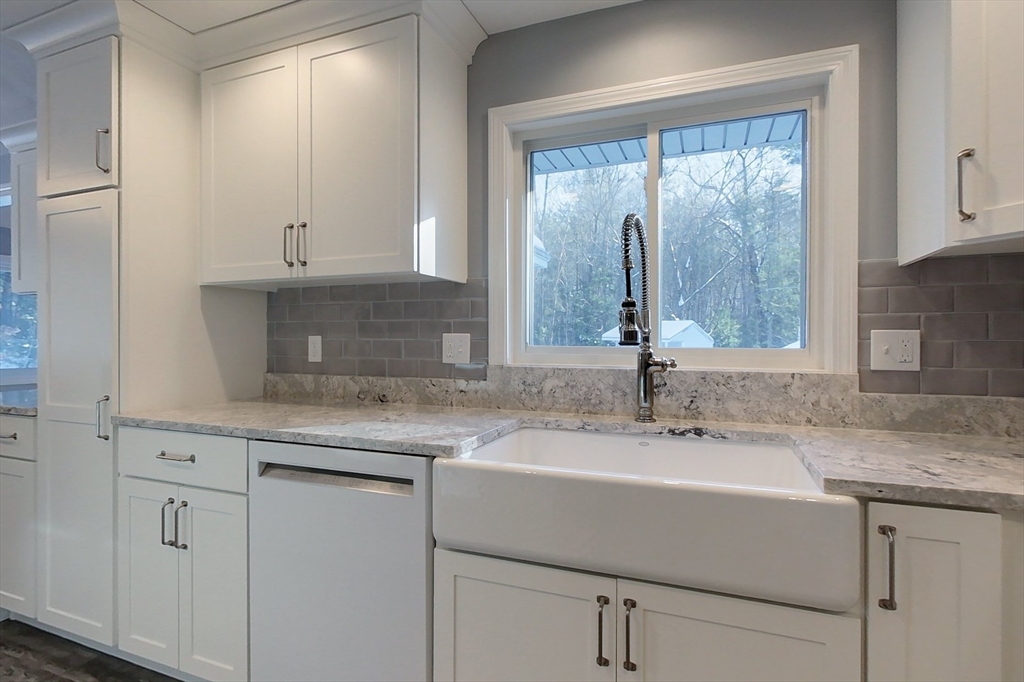 154 Townsend Street Pepperell, MA 01463 - Photo 3 of 42 a sink with a window