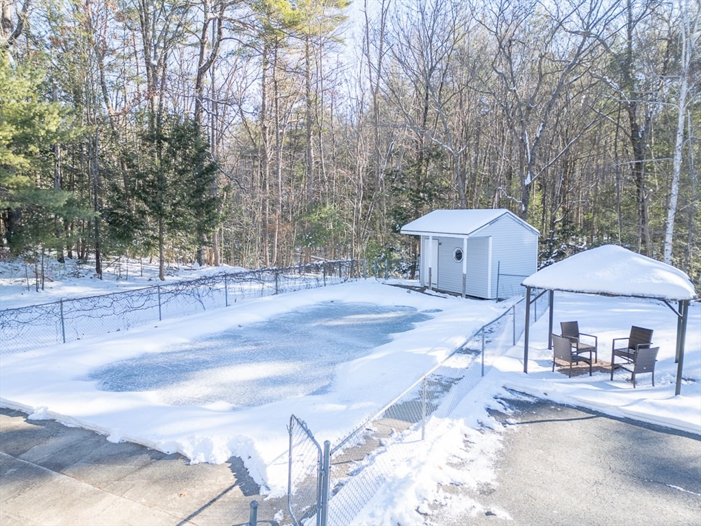 154 Townsend Street Pepperell, MA 01463 - Photo 33 of 42 a front view of a house with garden
