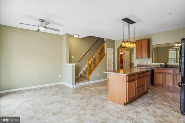a view of a wooden deck and a yard