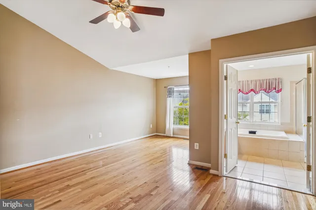 a view of staircase with white walls