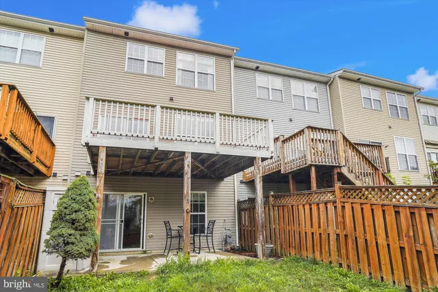 a big yard with lots of green space and trees