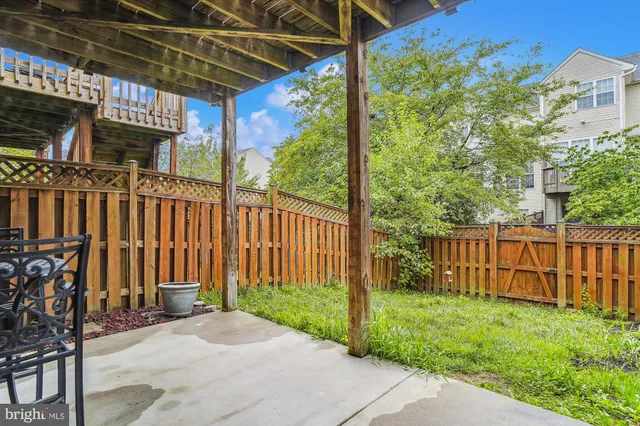 a front view of house with a garden