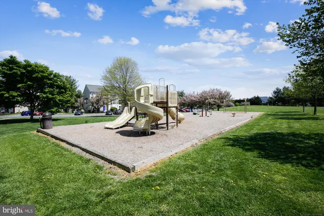 a view of street and car parked