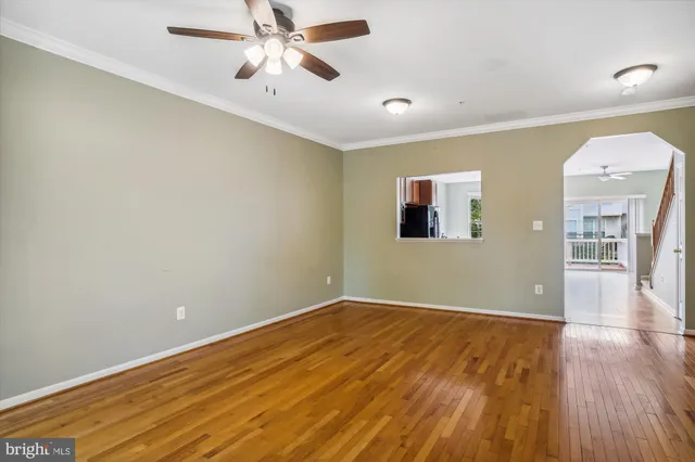 a kitchen with stainless steel appliances granite countertop a refrigerator a stove top oven a sink and dishwasher