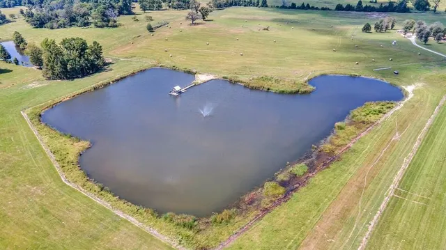 a view of a swimming pool with an outdoor space