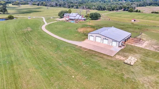 a view of a lake with a yard