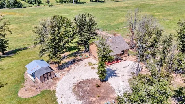 a view of a yard with an outdoor space