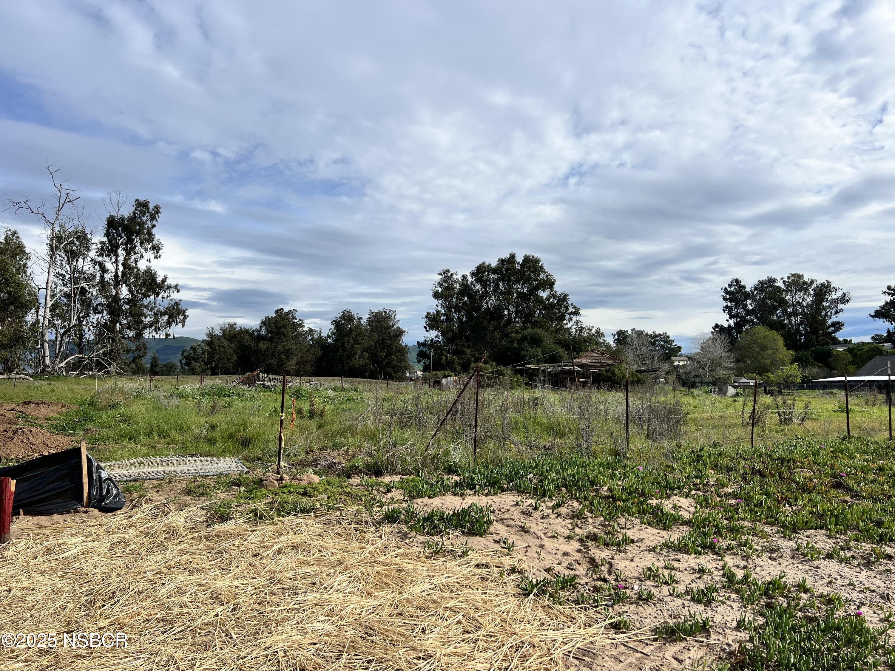 Grove Lane Nipomo, CA 93444 - Photo 2 of 10 a view of a lake with houses in the back