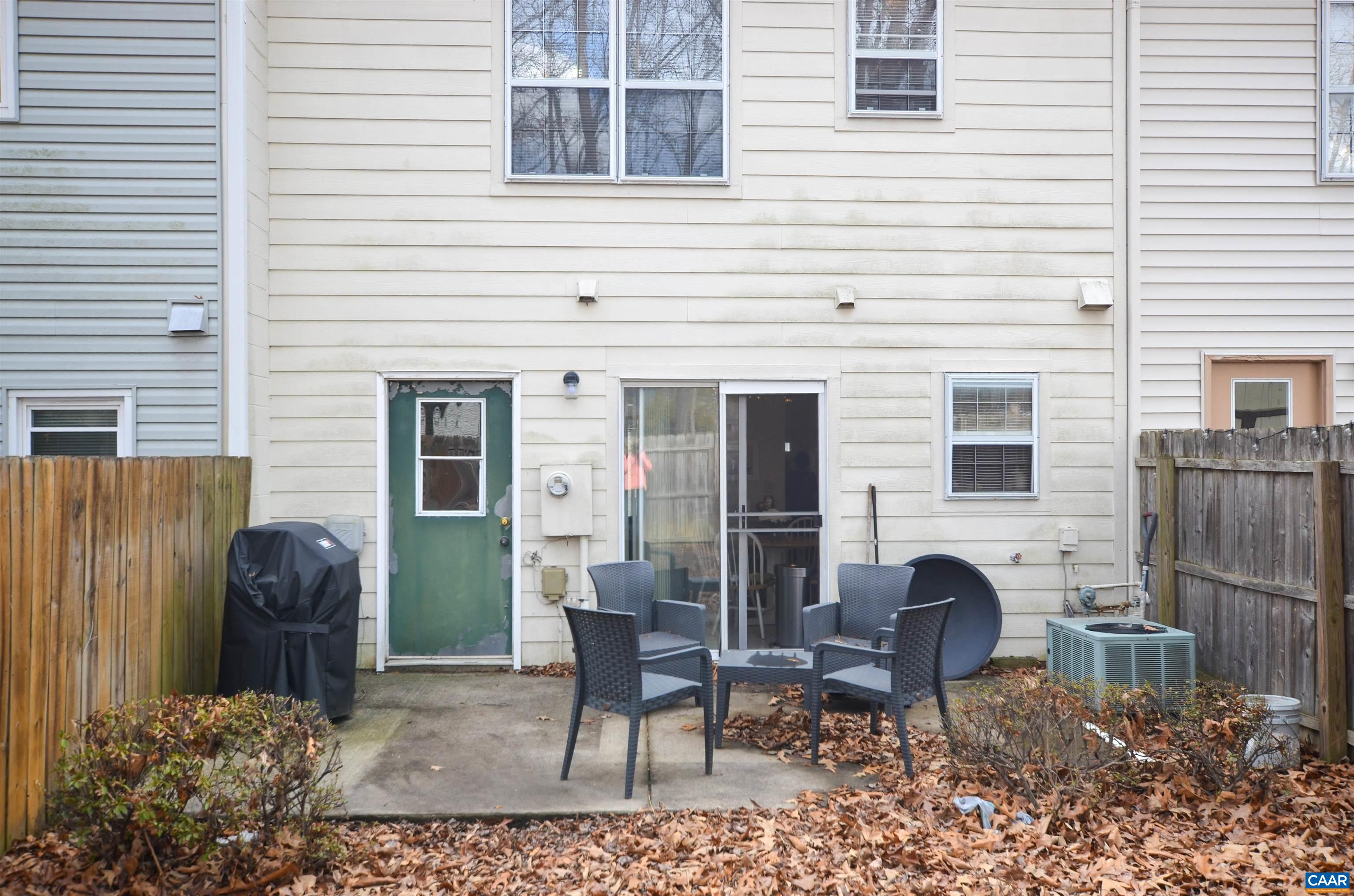 1594 Cool Spring Road Charlottesville, VA 22901 - Photo 11 of 26 a view of a chairs and a table in the back yard