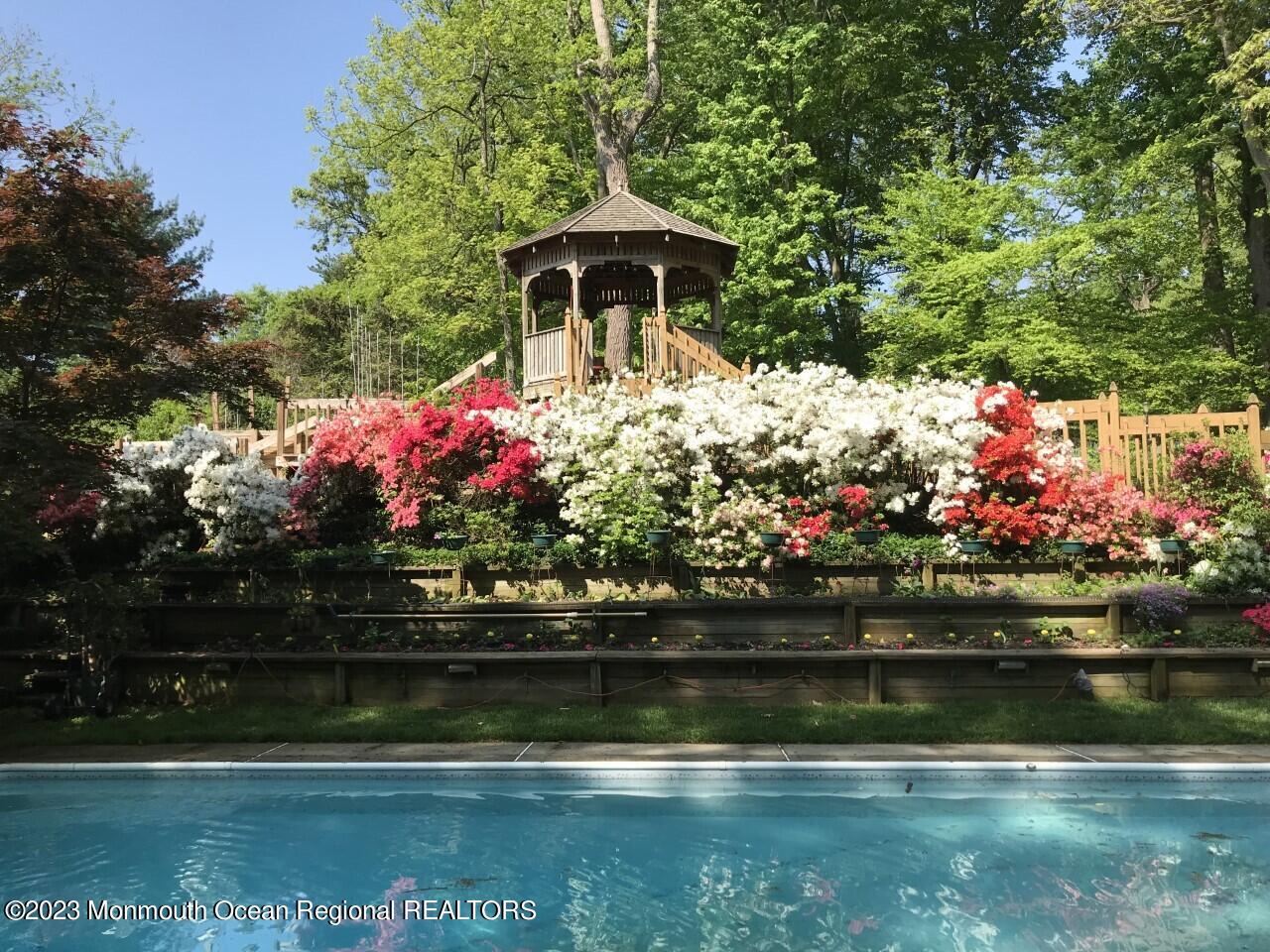 5 Rosedale Terrace Holmdel, NJ 07733 - Photo 4 of 55 Beautiful tiered gardens/Gazebo/Pool