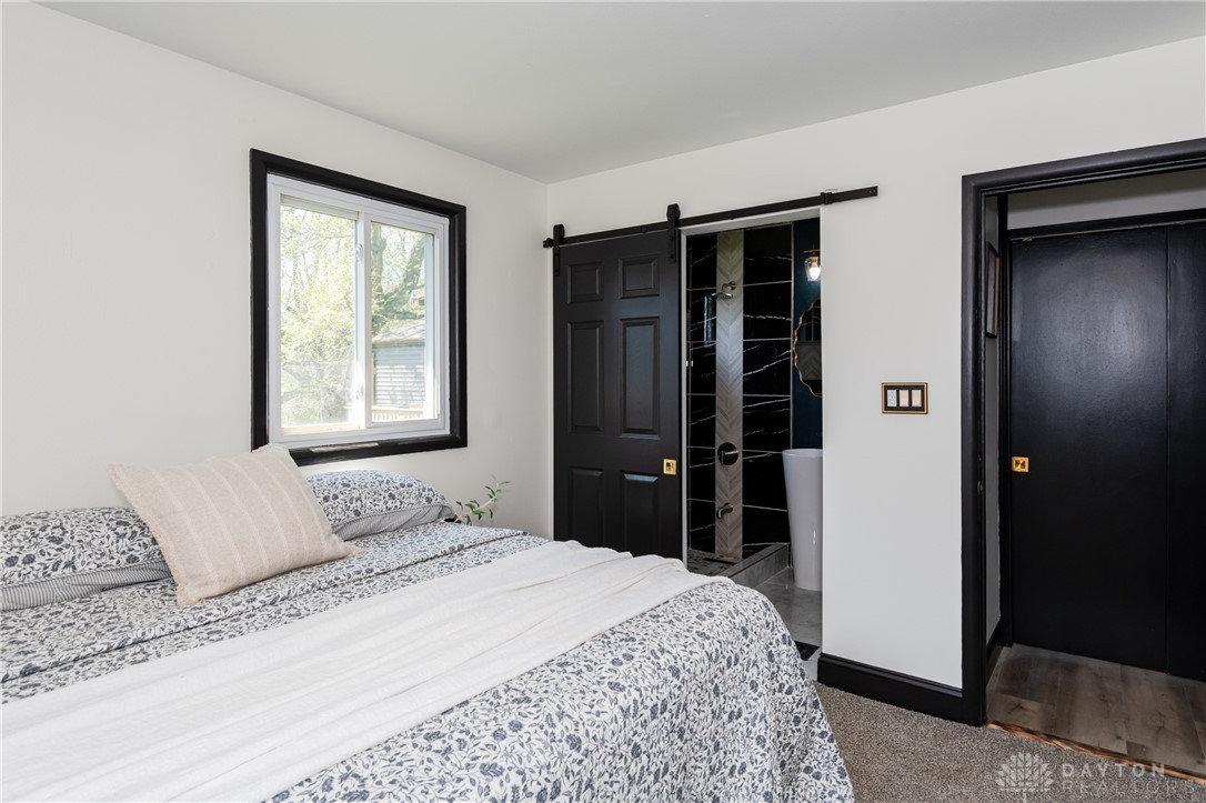 5240 Haverfield Road Dayton, OH 45432 - Photo 32 of 58 This cozy room offers a private oasis with a sophisticated attached bathroom.