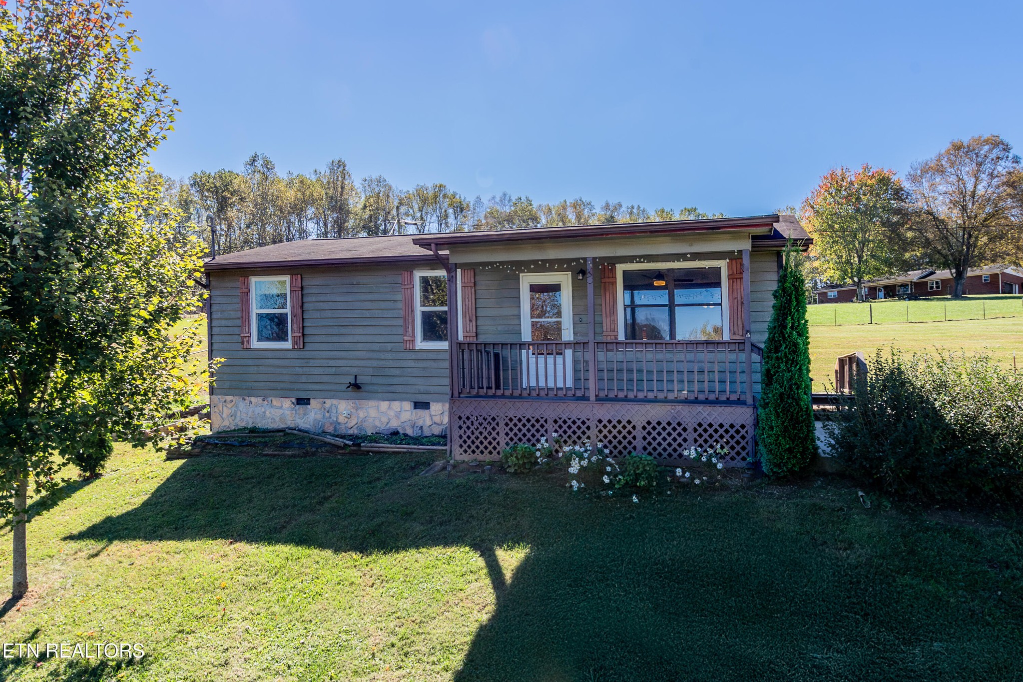 a view of a house with a garden