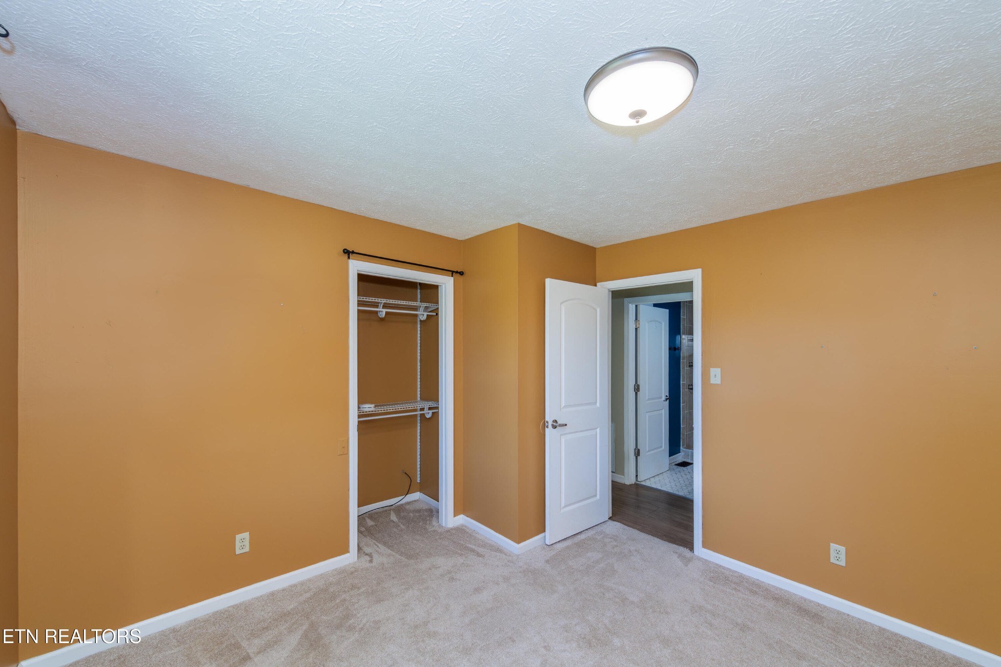 759 Laurel Road Clinton, TN 37716 - Photo 17 of 28 an empty room with a empty space and a window