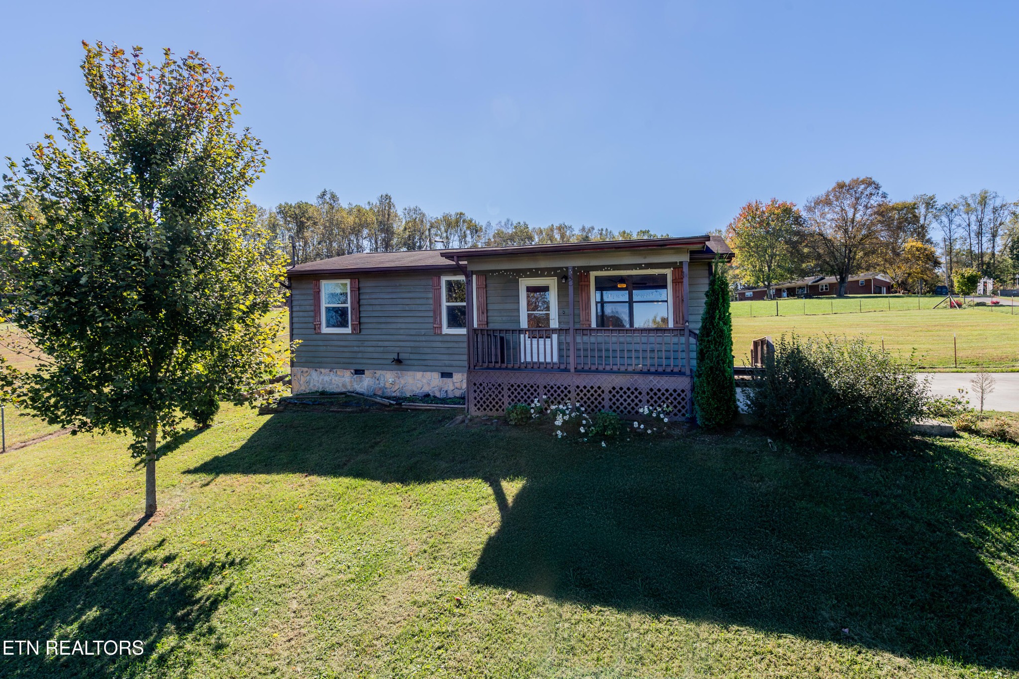 759 Laurel Road Clinton, TN 37716 - Photo 26 of 28 a view of a house with a yard