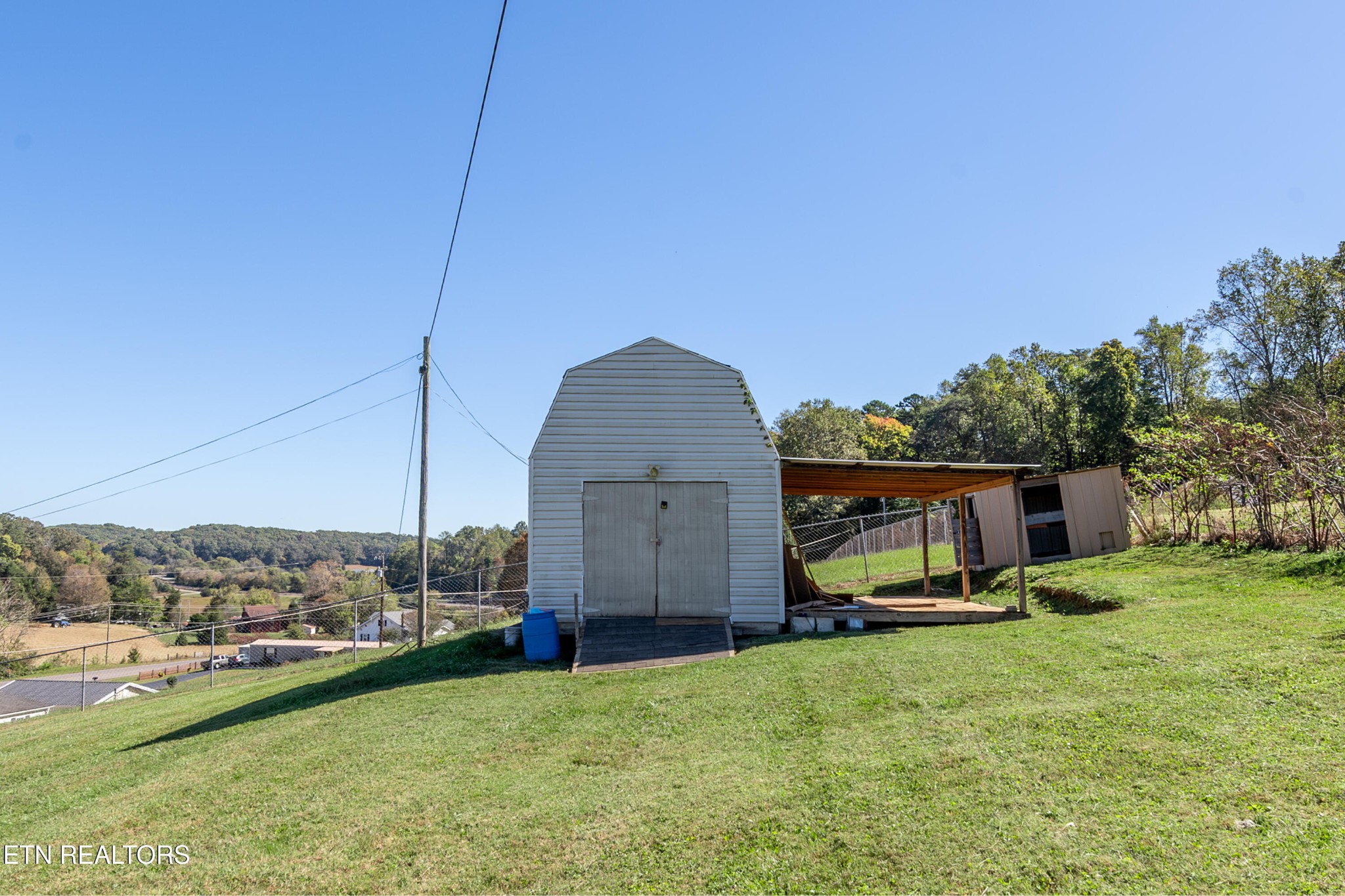 759 Laurel Road Clinton, TN 37716 - Photo 7 of 28 a view of a backyard with sitting area