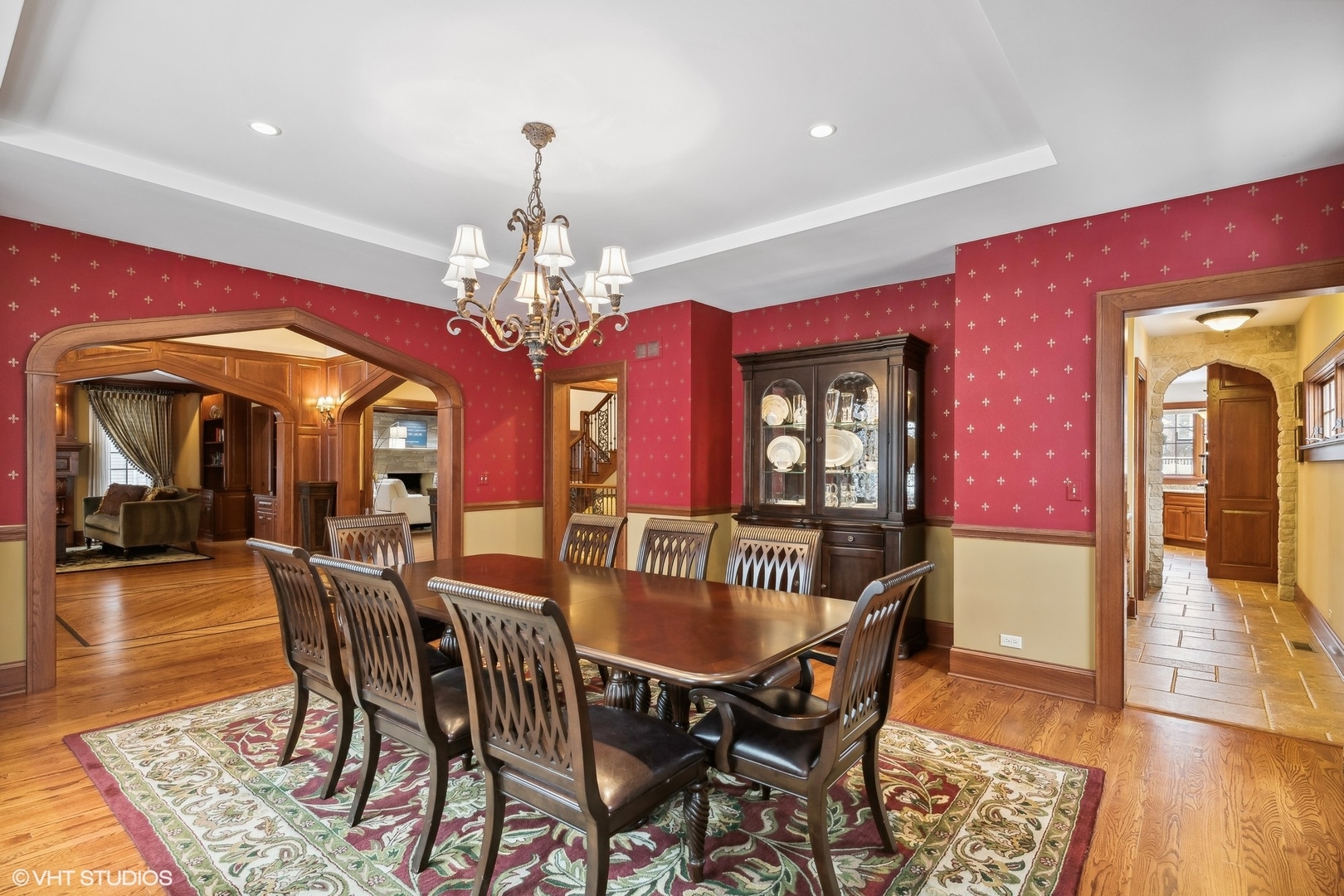 381 Argyle Avenue Elmhurst, IL 60126 - Photo 12 of 63 a dining room with furniture a chandelier and wooden floor