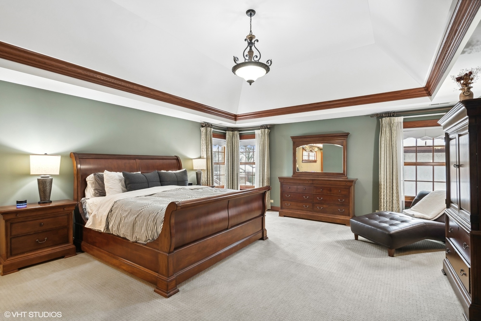 381 Argyle Avenue Elmhurst, IL 60126 - Photo 25 of 63 a bedroom with a bed and a chandelier