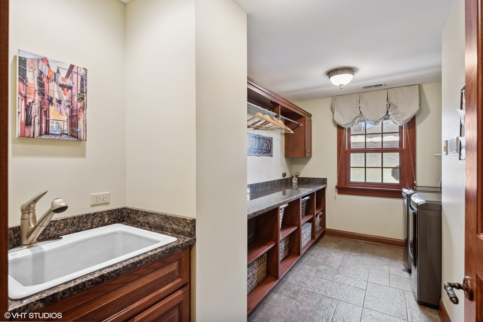 381 Argyle Avenue Elmhurst, IL 60126 - Photo 38 of 63 a kitchen with a sink stove and cabinets