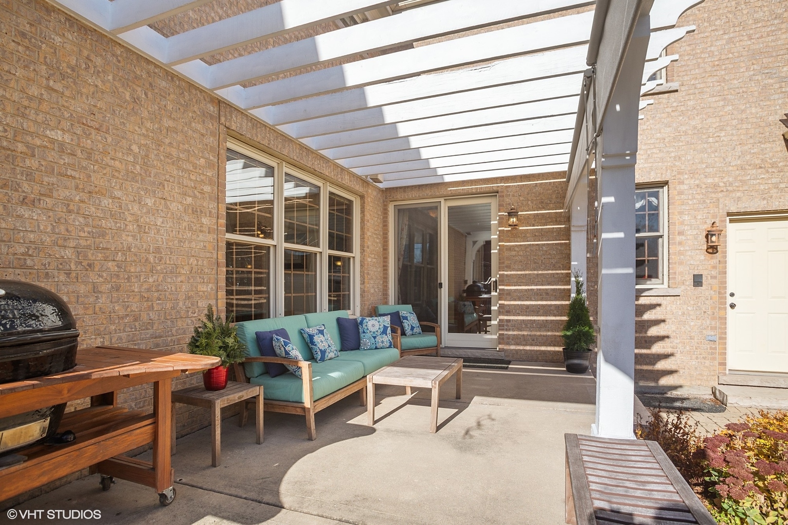 381 Argyle Avenue Elmhurst, IL 60126 - Photo 52 of 63 a backyard of a house with outdoor seating