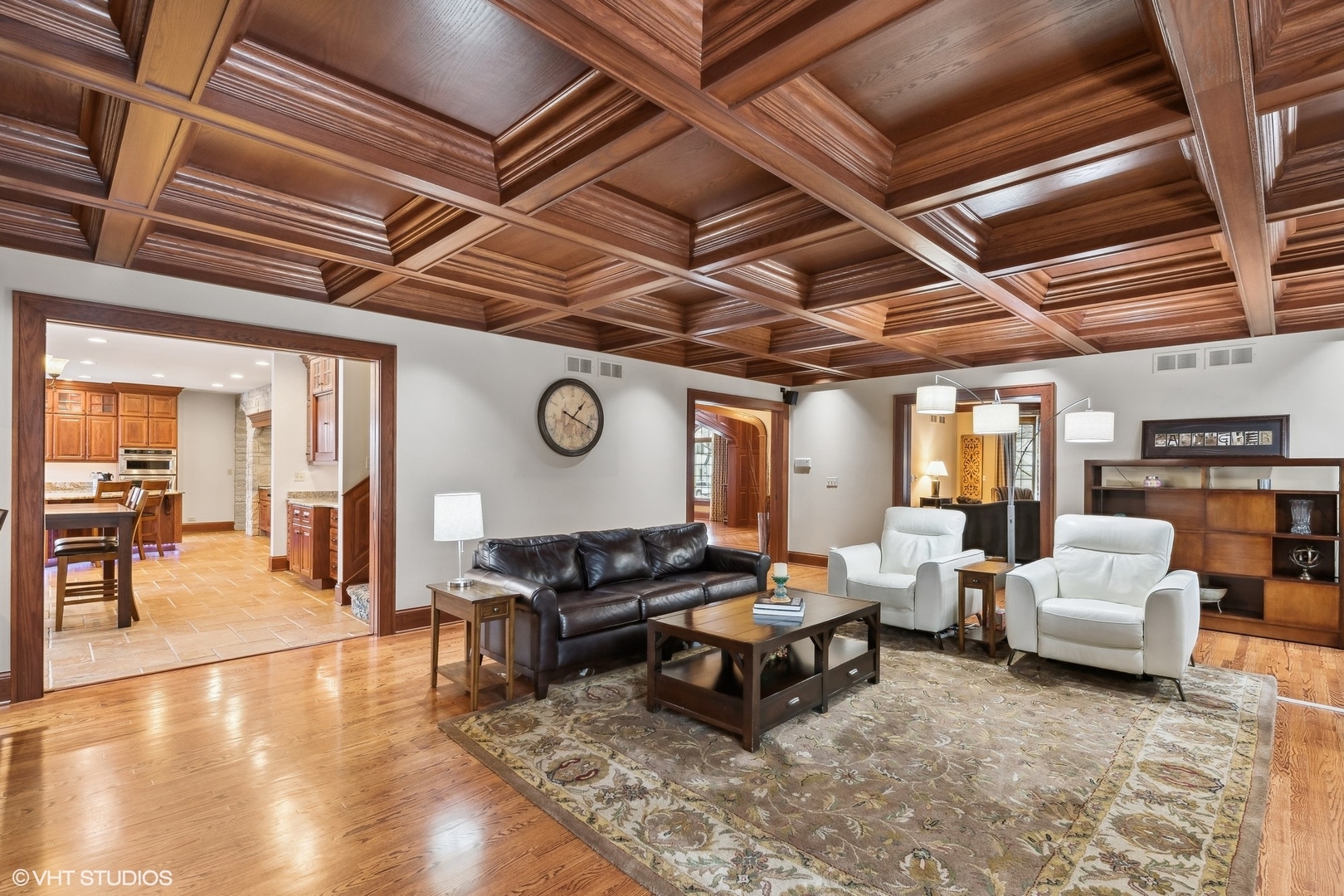 381 Argyle Avenue Elmhurst, IL 60126 - Photo 8 of 63 a living room with furniture and a clock