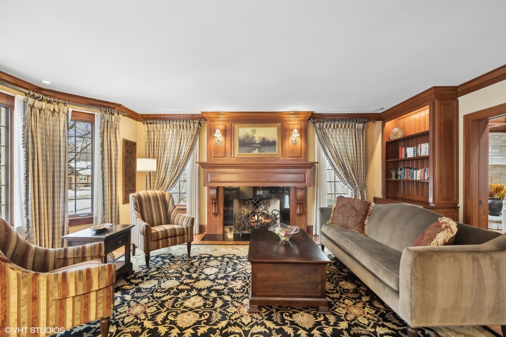 381 Argyle Avenue Elmhurst, IL 60126 - Photo 9 of 63 a living room with furniture and a fireplace