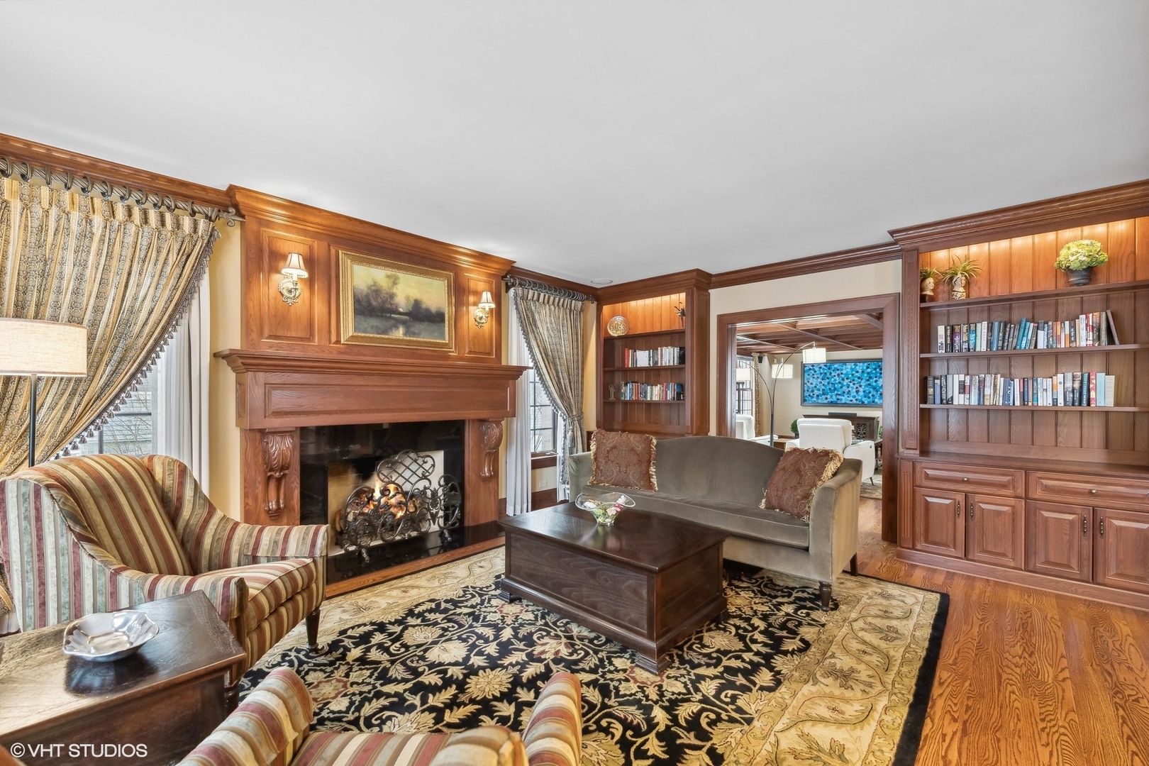 381 Argyle Avenue Elmhurst, IL 60126 - Photo 10 of 63 a living room with furniture and a fireplace